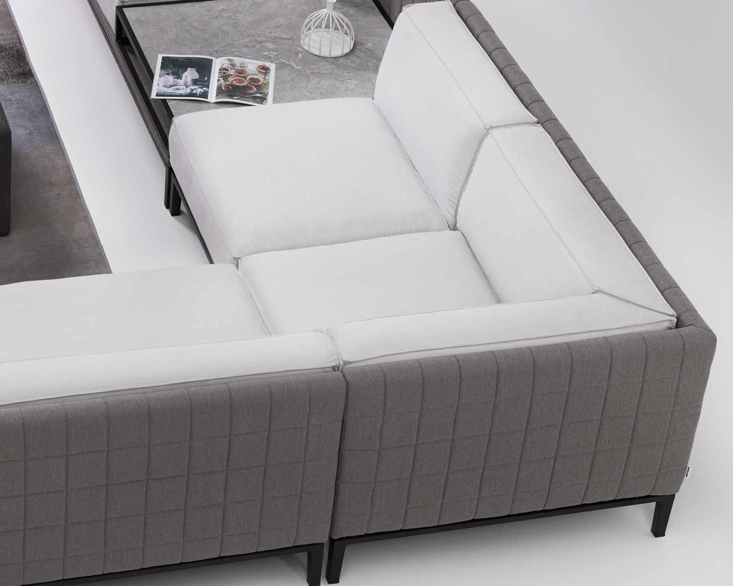 Grand canapé avec méridienne et tablette pierre "Saparua Island"