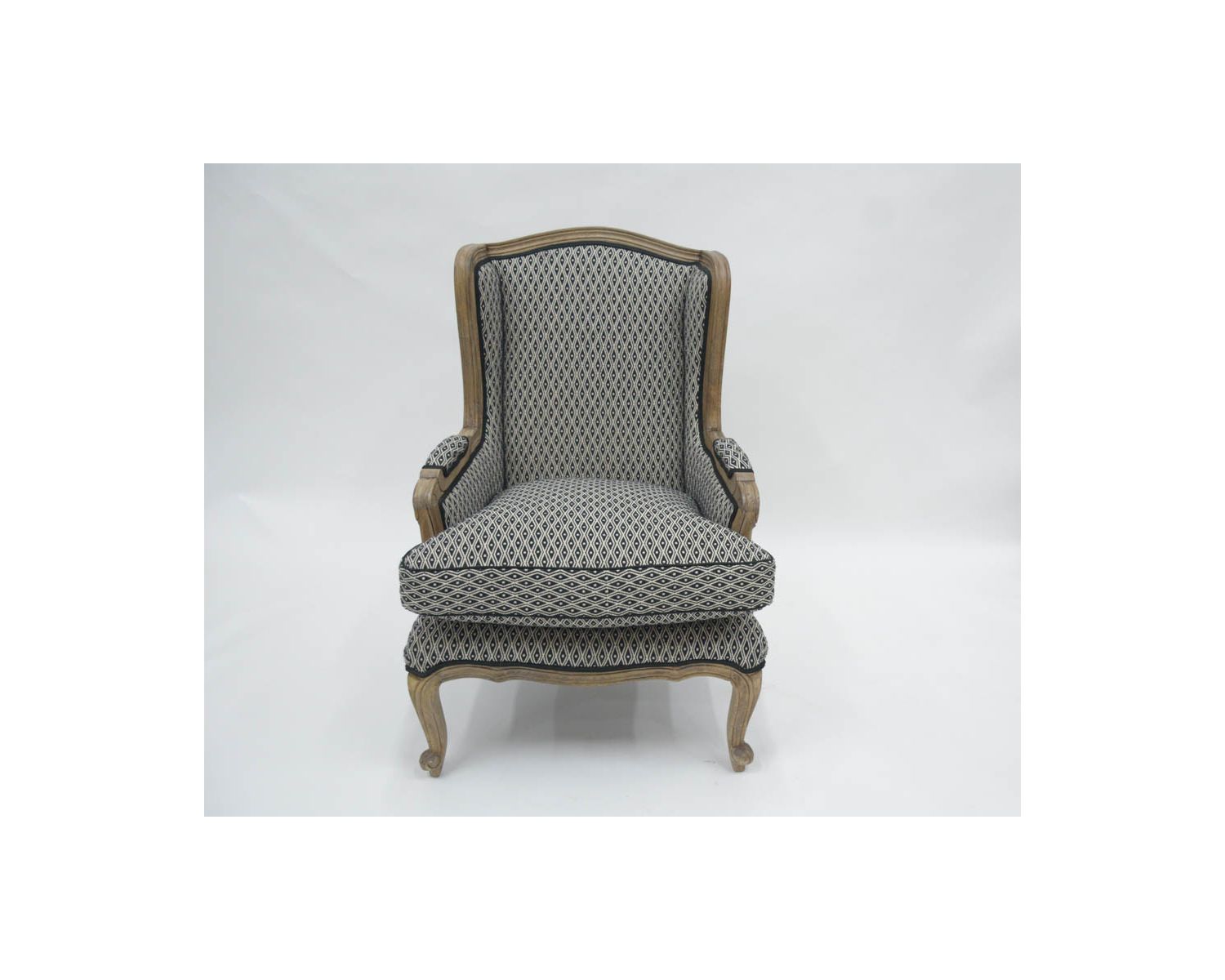 Fauteuil bergère "Sofia" bois massif et tissu noir et blanc à losanges