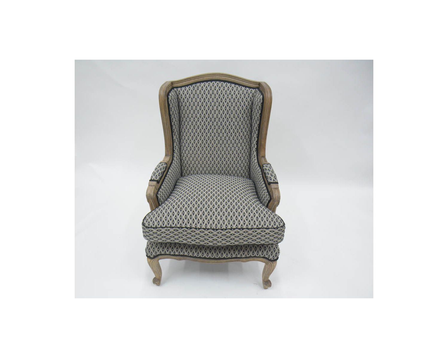 Fauteuil bergère "Sofia" bois massif et tissu noir et blanc à losanges