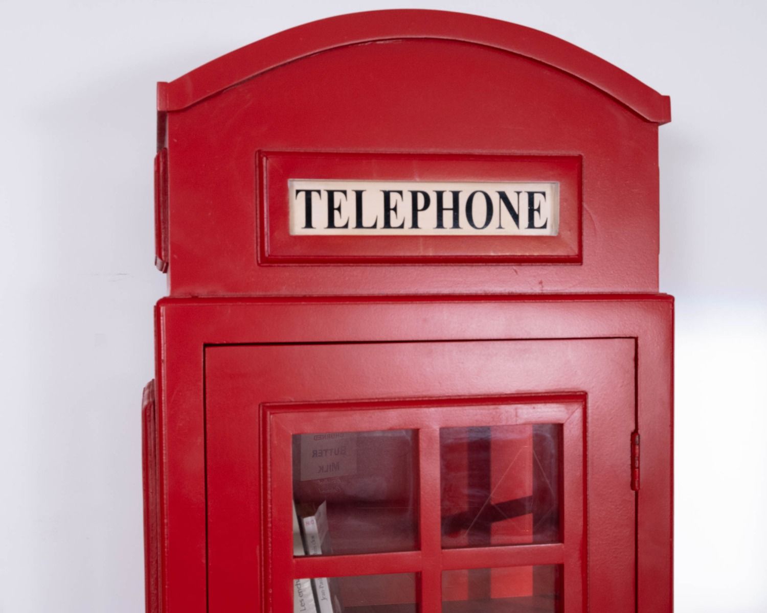 Vitrine cabine téléphonique londonienne rouge "Crazy"