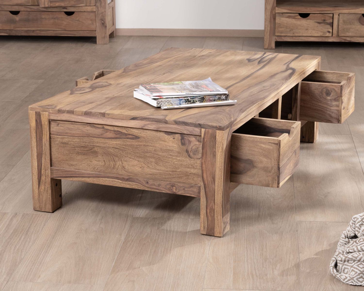 Table de salon 135 cm avec tiroirs recto-verso "Kalanohé" en palissandre