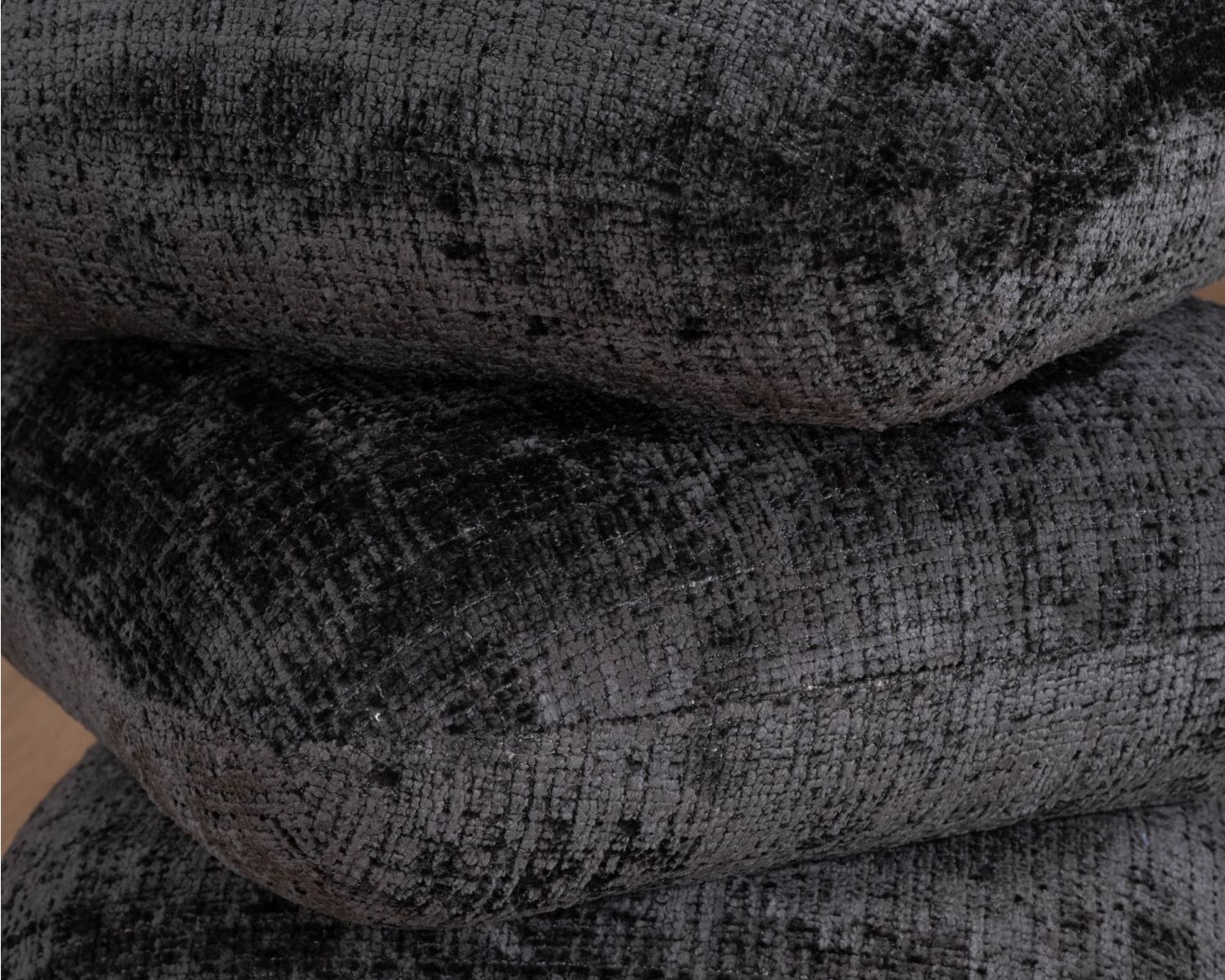 Pouf « Flow » tournant à trois niveaux en tissu tramé gris anthracite au toucher doux