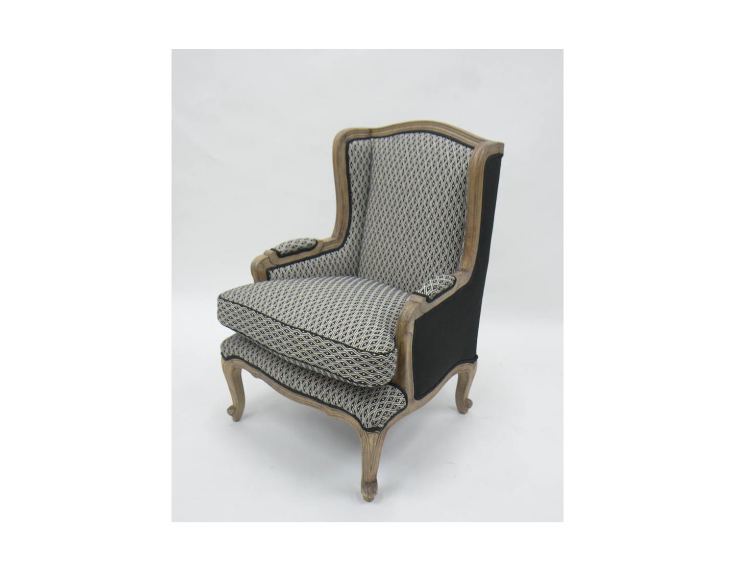 Fauteuil bergère "Sofia" bois massif et tissu noir et blanc à losanges