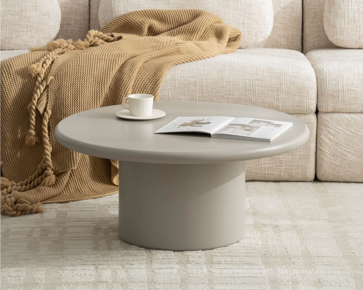 Table basse ronde minimaliste "Nalya" coloris beige à pied central