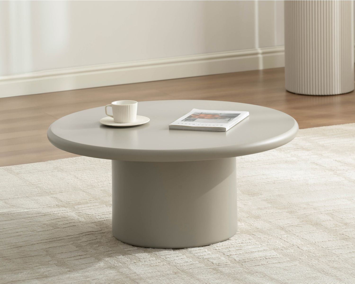Table basse ronde minimaliste "Nalya" coloris beige à pied central