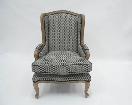 Fauteuil bergère "Sofia" bois massif et tissu noir et blanc à losanges