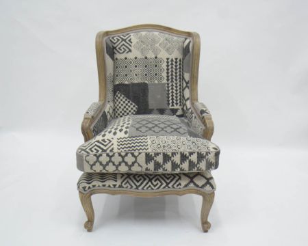 Fauteuil bergère tissu patchwork gris et bois naturel clair "Sofia"