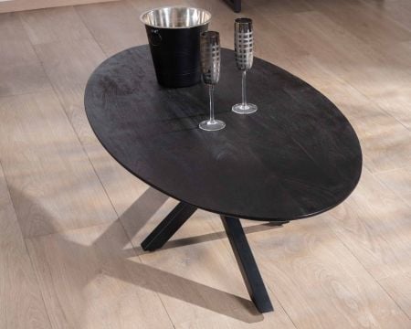 Table basse noire plateau ellipse en manguier massif sablé et pieds métal 3D "Pise"