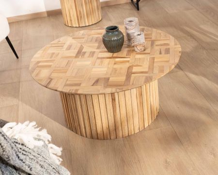 Table de salon avec plateau rond en marbre et pied central en bois