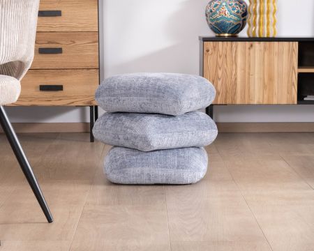 Pouf design pivotant en tissu tramé bleu glacier à reflets lumineux « Flow » esprit scandinave