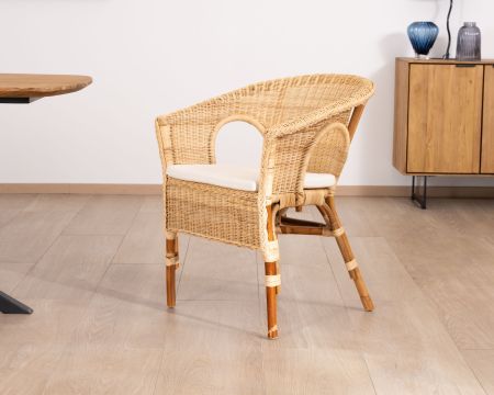 Elégant petit fauteuil en rotin tressé avec assise tissu "Noho"