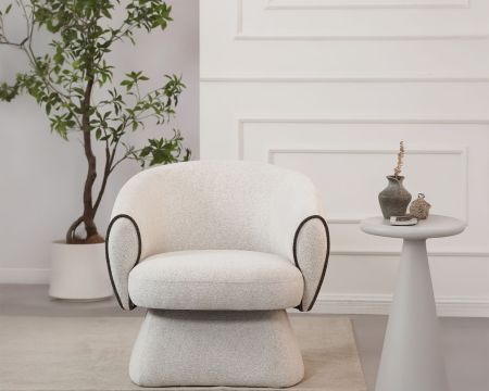Petit fauteuil lounge en tissu bouclette blanc cassé "Sweet Culture" design enveloppant