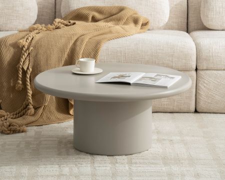 Table basse ronde minimaliste "Nalya" coloris beige à pied central