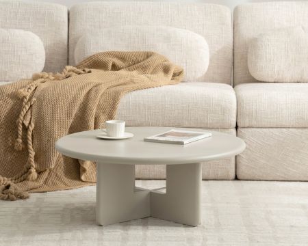 Table basse ronde 80 cm beige "Nalya" à piètement sculptural