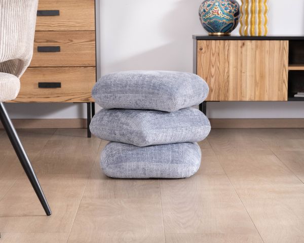 Pouf design pivotant en tissu tramé bleu glacier à reflets lumineux « Flow » esprit scandinave