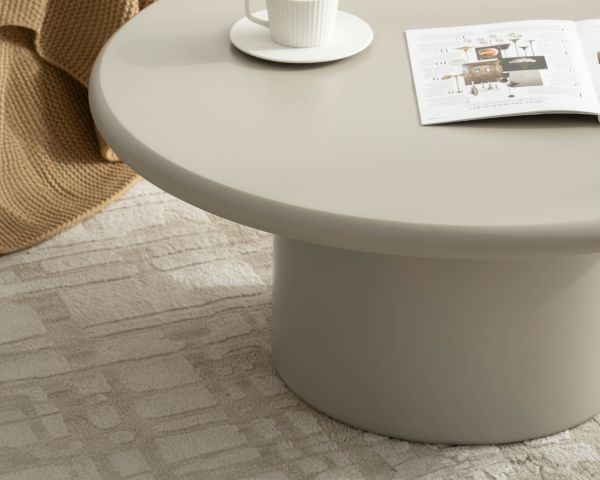 Table basse ronde minimaliste "Nalya" coloris beige à pied central